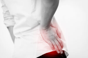 A person having hip pain and could claim hip injury compensation.