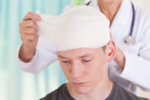 An image shows an injured person with a brain injury.